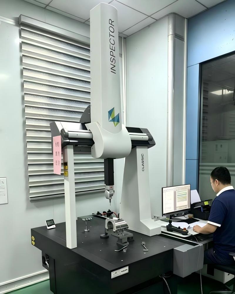 Dimensional inspection with a coordinate measuring machine