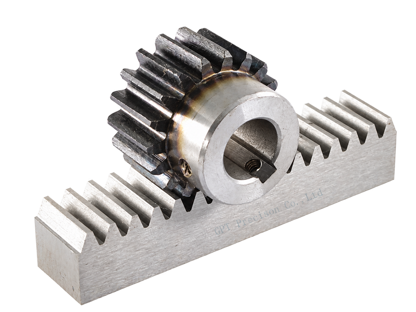 A metal pinion gear meshing with the teeth of a straight gear rack